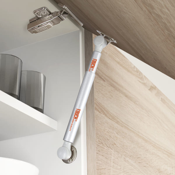 Free stop cabinet doors gas spring strut TCH-31207 FR.245 with adjustable stopping, smooth motion, and durable construction for modern cabinetry
